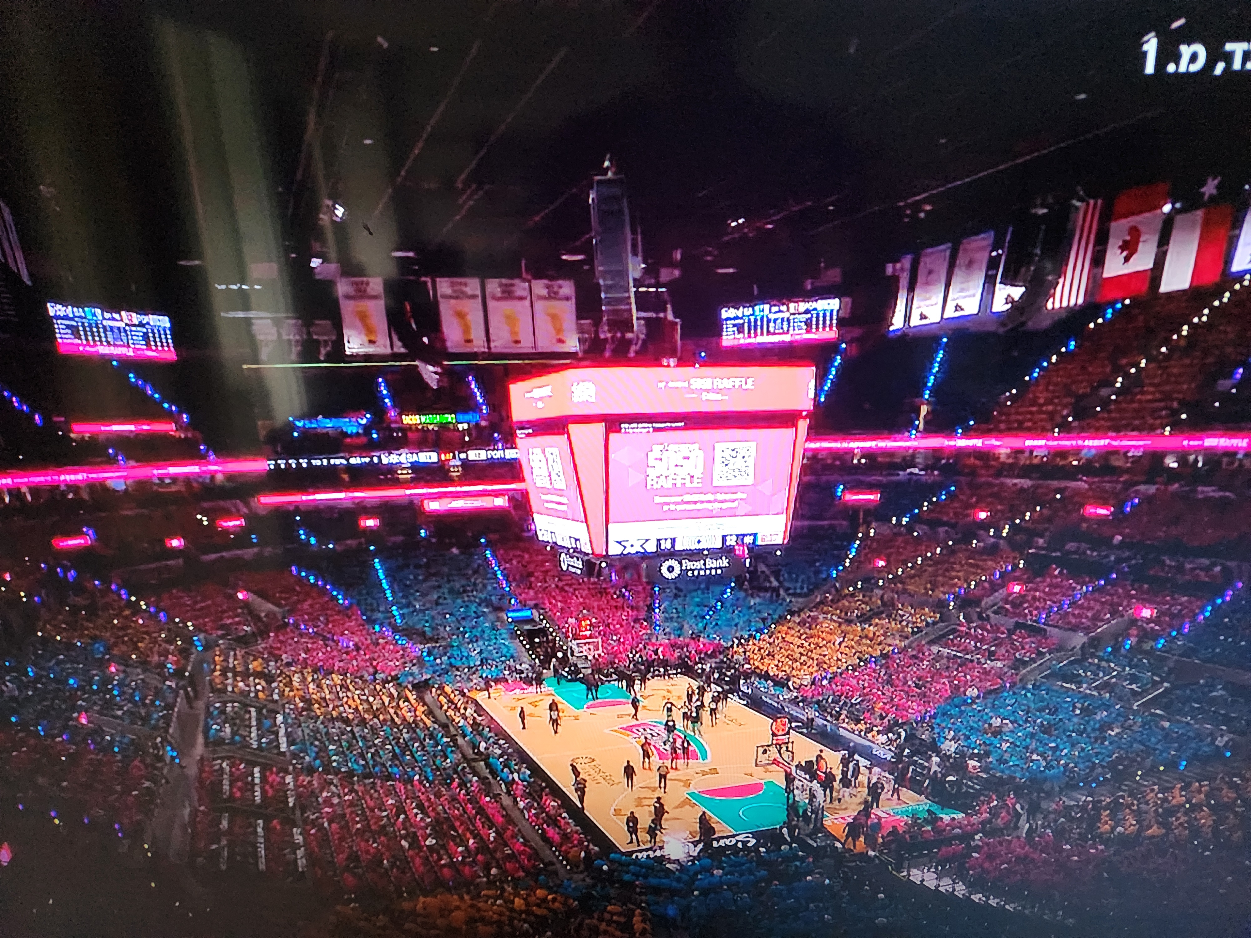 Arena crowd in coordinated shirt colors